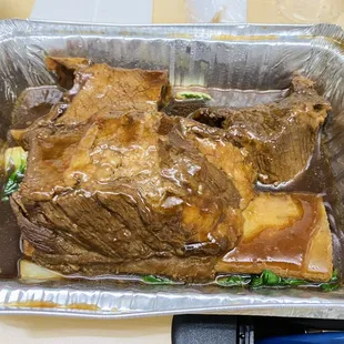 a roast in a foil container