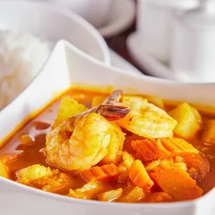 A mild yellow curry with shrimp, carrots, onions and pineapple.