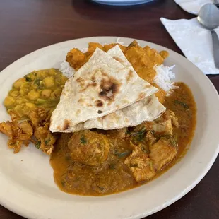 Goat curry, chickpea curry, Chicken Tikka Masala, naan