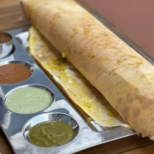 Egg dosa with onions and chutney (coriander, coconut, tomato) and lentils