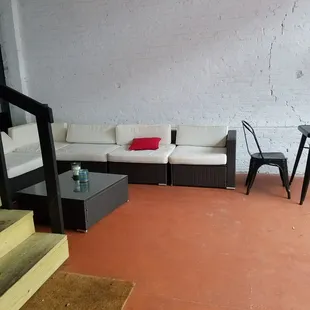 a couch, table, and chairs