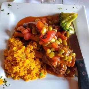 Lamb shank with saffron rice and lima beans,  and made with lots of love.  Very tender and flavorful.
