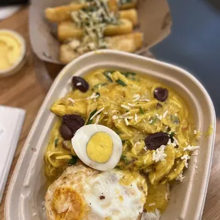 Yuca fries ($6), Aji de Gallina Bowl ($19)  IG: @ohmyono