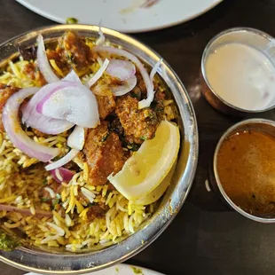 Vijayawada chicken briyani...I forgot to take a picture at first so we had already started to serve from it.