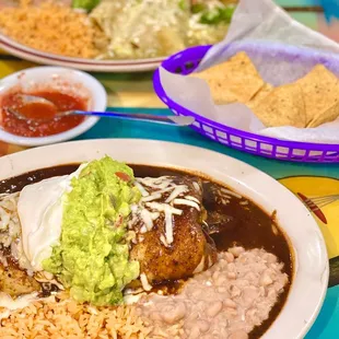 wet burrito with sweet mole sauce, enchiladas with green sauce (10/2022)