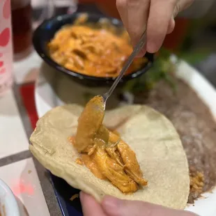 Lupe's special (Chicken in chipotle sauce served with tortillas made in house)