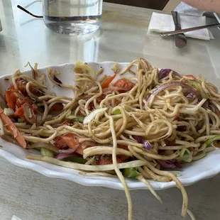stir fry Veg Hakka Noodles add chicken.