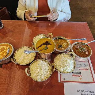 a table full of indian food