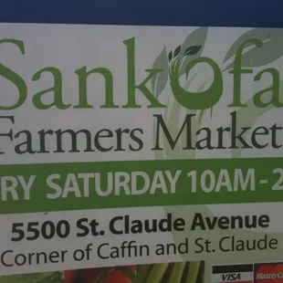 a sign for a farmers market
