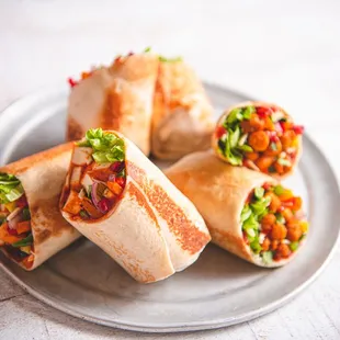 three burritos on a plate