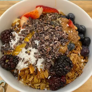 a bowl of granola and berries