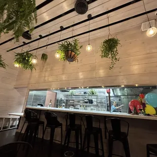 Indoor bar - they have 4 dining tables too