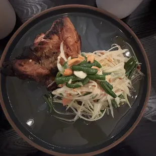 Bbq jidori chicken with papaya salad.