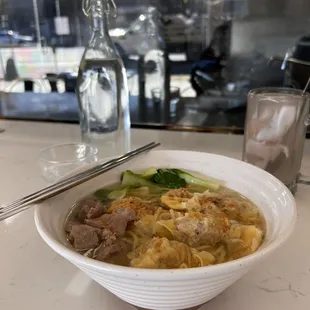 Wantons with egg noodles and spicy pork