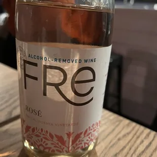 a bottle of wine sitting on a table