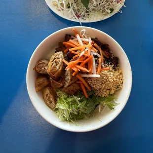 a bowl of food on a blue table