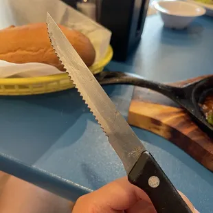 First dirty knife they gave me with hair stuck on the knife because the knife was so dirty/sticky.