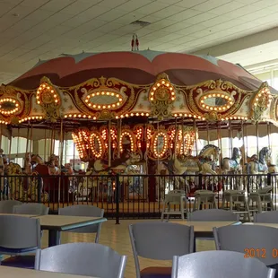 a merry go round in a mall