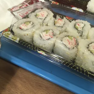 a tray of sushi rolls