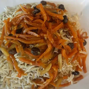 a plate of rice and carrots