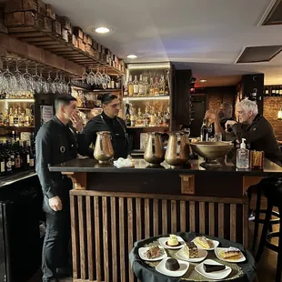 two men at a bar