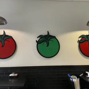tomatoes on the wall