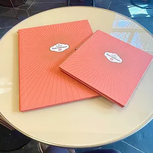 a table with two books on it
