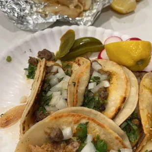 Tacos with grilled onions on the side