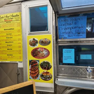 a food truck with menus