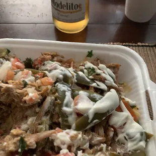 Nachos with a side modelito (beer from home)