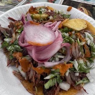 Tacos Al pastor prepared with my favorite - spiciest sauce plus, raw onion, cilantro and pickled red onions with habanero peppers