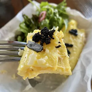 French Omelette with a salad and delicious bread.
