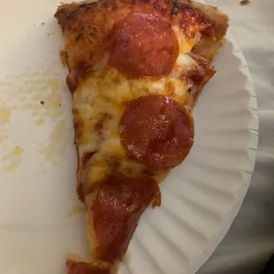 a slice of pepperoni pizza