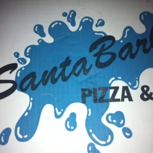 a sign for santa barbara pizza and grill