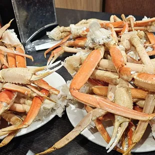 two plates of crab legs