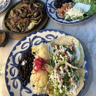 Cochinita tacos and beef fajitas