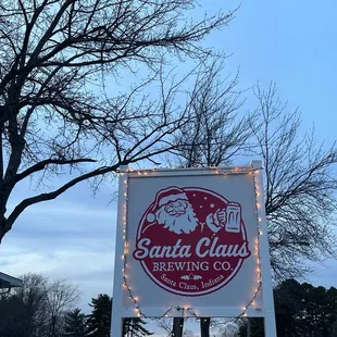 a sign for santa claus brewing co