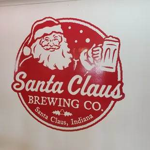 santa claus holding a beer