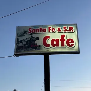 a sign for santa fe and sp cafe