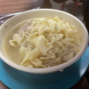 a bowl of chicken noodle soup