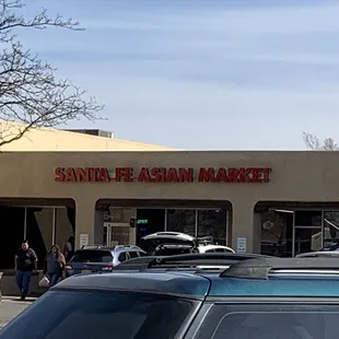 cars parked in front of the store