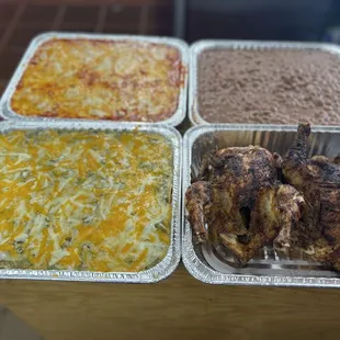 Red, green enchiladas, roasted chicken and pinto beans