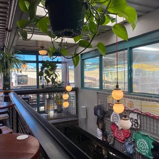 Upstairs indoor seating and merch