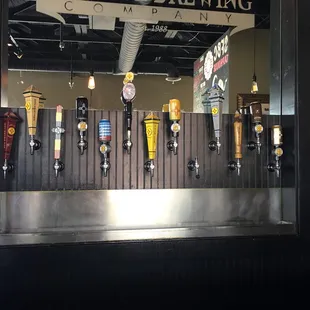 a row of beer taps
