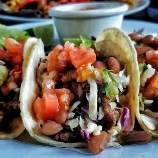 three tacos on a plate