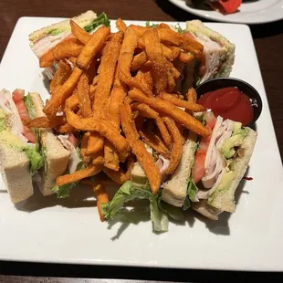 Club sandwich with sweet potato fries