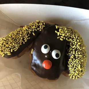 Chocolate glazed puppy dog doughnut