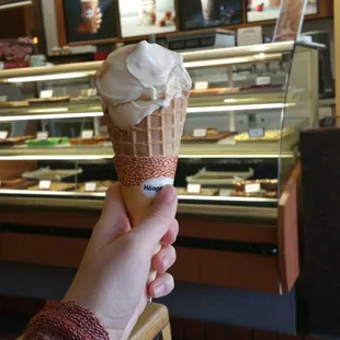 Dulce de Leche ice cream in a waffle cone.
