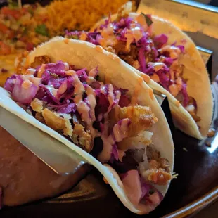 three tacos on a plate