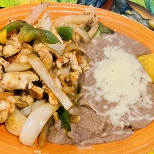 Chcken fajita lunch special I like all beans no rice came with all the fixings on the side.